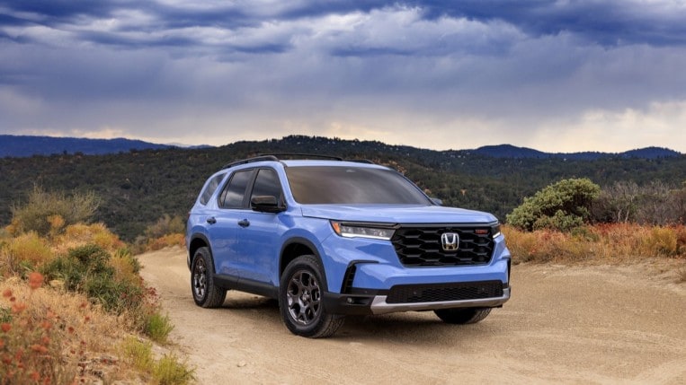 The 2023 Honda Pilot TrailSport from a front quarter angle